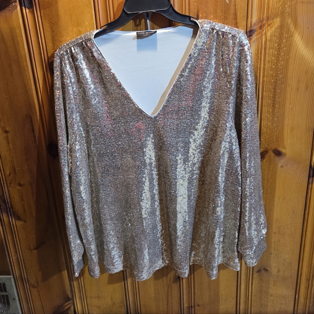  Lane Bryant gold sequin V-neck long-sleeve top. 